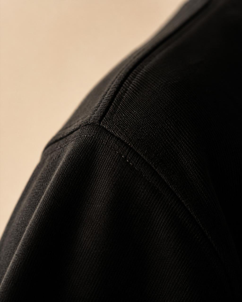 Close detail of Spuraeon heavyweight cotton and stitching